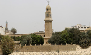 The clock tower of Qushla is seen at noon in central Baghdad