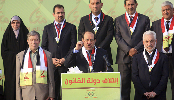Maliki speaks to his supporters during a ceremony in Kerbala