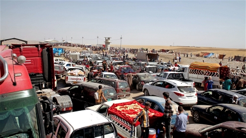Long queues await those at the Khazair checkpoint
