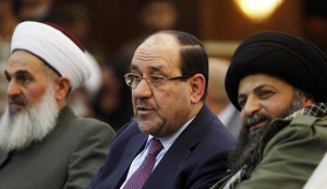Iraqi Vice President Maliki speaks with Jazaeiri, Deputy Commander General of Saraya al-Khorasani, at a ceremony honouring fighters of group who died during their fight against Islamic State, in Baghdad